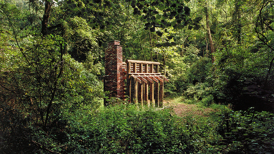 Thoreau’s Hut, 2003
Pine, cedar, recycled brick, flagstone, and stainless steel on concrete pad. 
Height: 15′ 3″; Width: 10′; Depth: 15′
